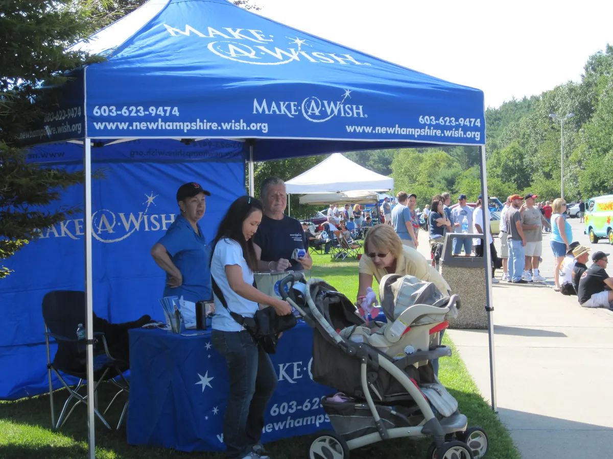 Branded tent setup at an outdoor event
